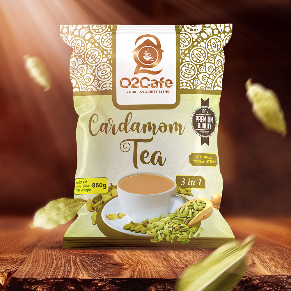 An 850g commercial packet of O2 Cafe Cardamom 3-in-1 tea resting on a wooden surface with floating cardamom pods, representing our premium milk tea premixes in Sri Lanka