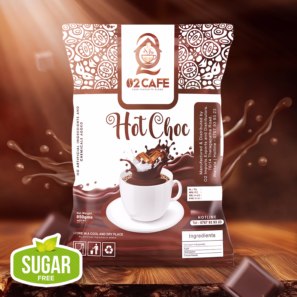 An 850g commercial packet of O2 Cafe Hot Choc featuring a prominent green Sugar Free badge, set against dynamic chocolate splashes, representing our sugar-free hot chocolate premix in Sri Lanka
